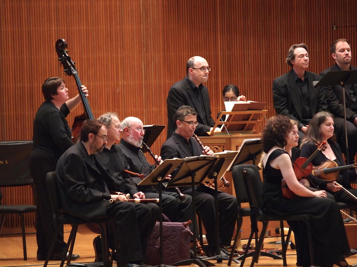 people performing with baroque instruments