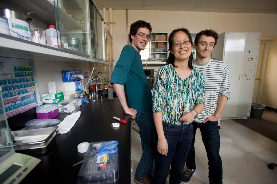 Professor and students enjoy a light moment in the lab.
