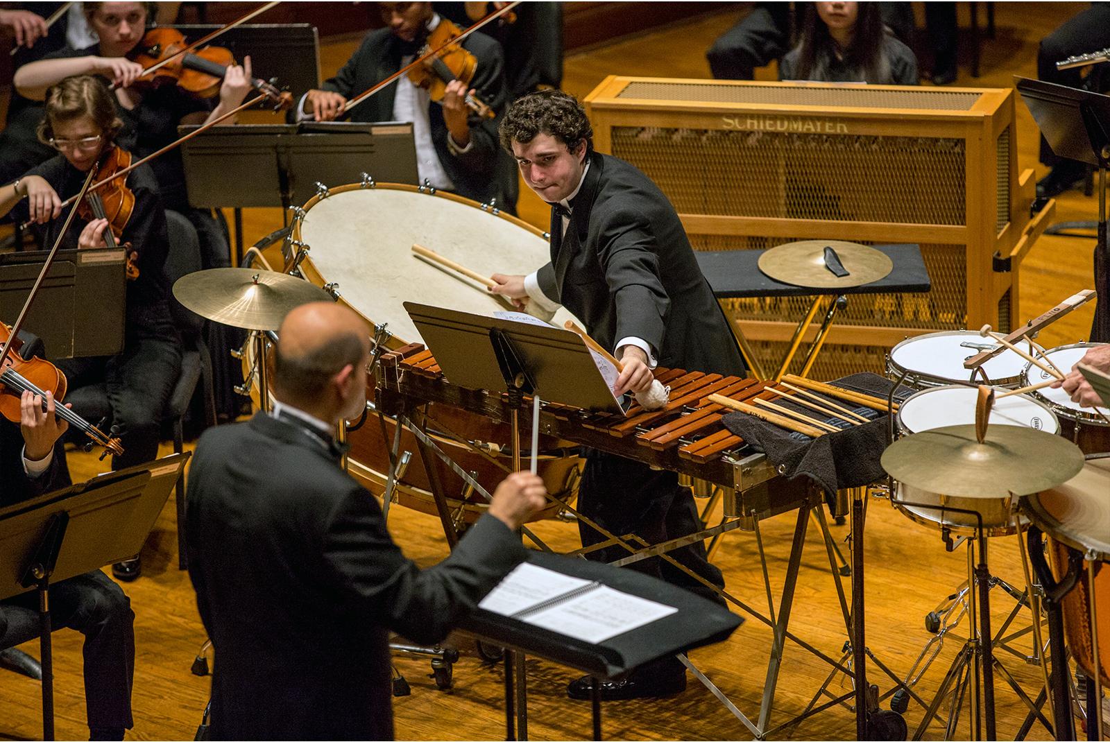 A percussion student occupies the solo spot with the Oberlin Orchestra.