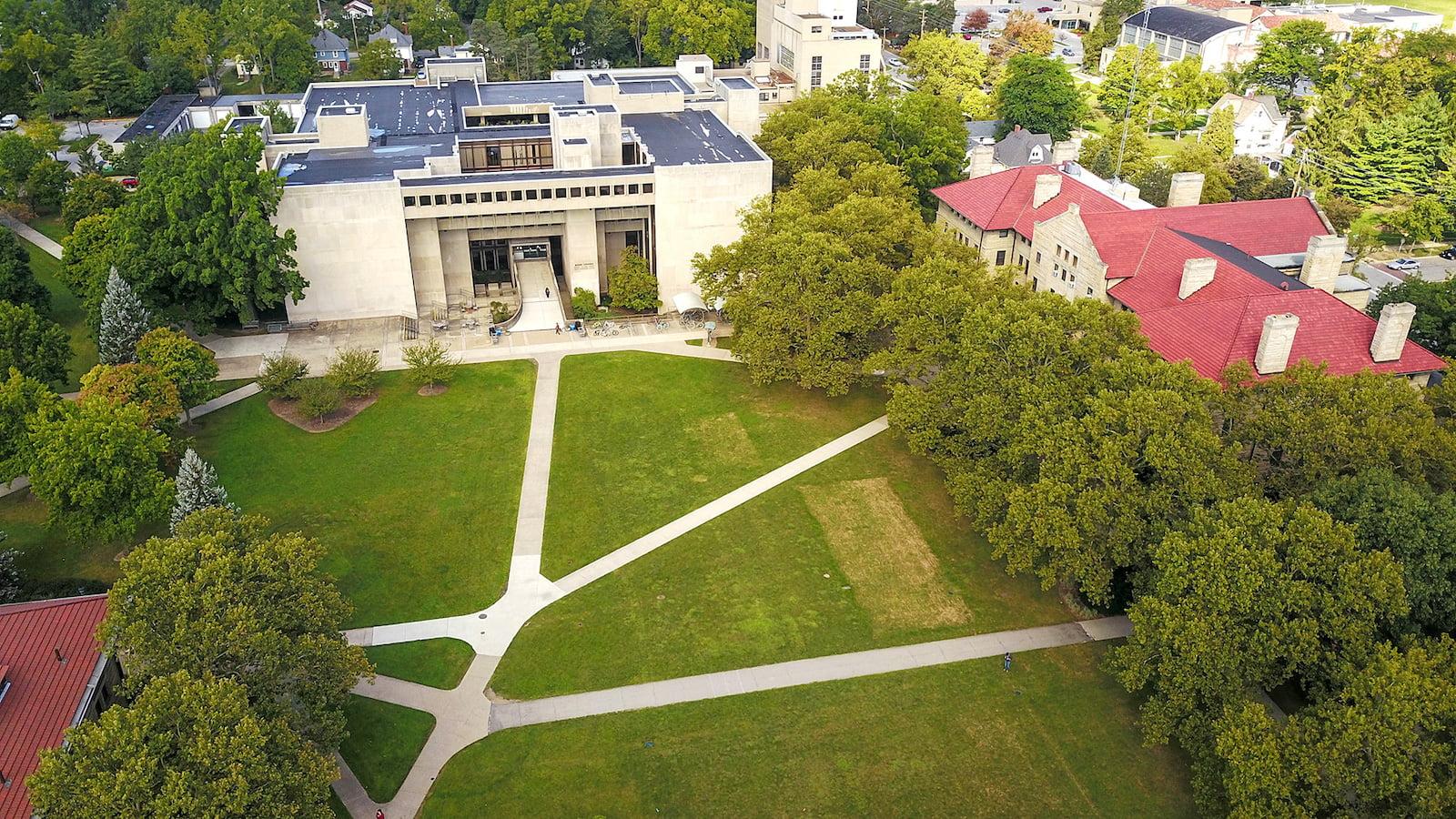 Aerial view of intersecting paths in a campus quad.