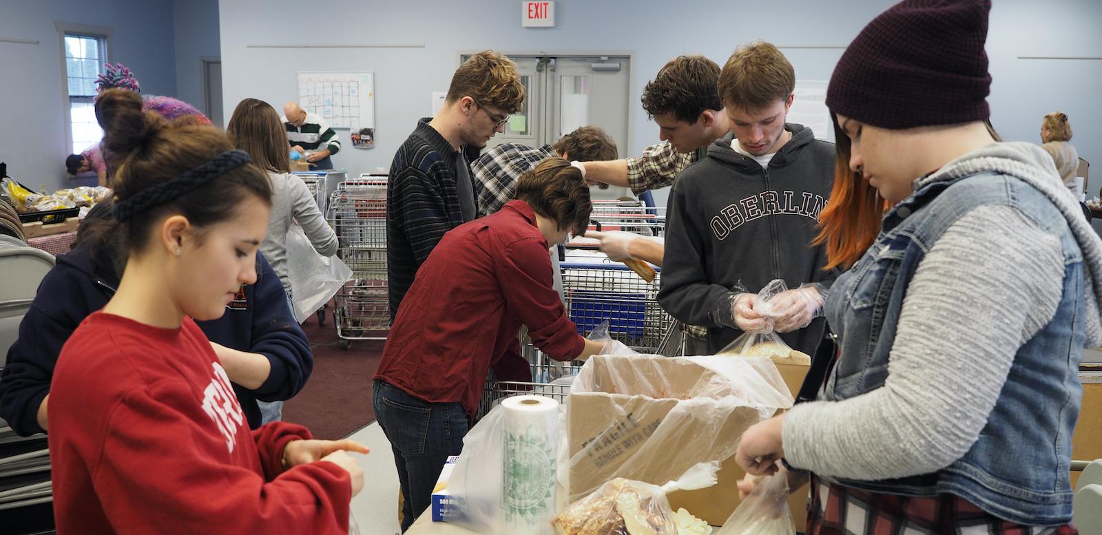 Students organizing food into boxes as part of MLK Day of Service