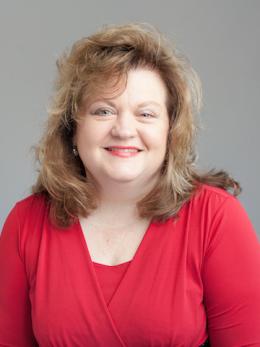 Head shot photo of Claudia Ferrini.