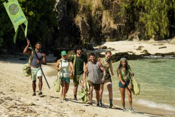 Matt Blankinship walks the beach with his tribe.