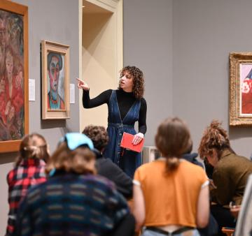 A group of students tours the Oberlin Allen Memorial art museum.