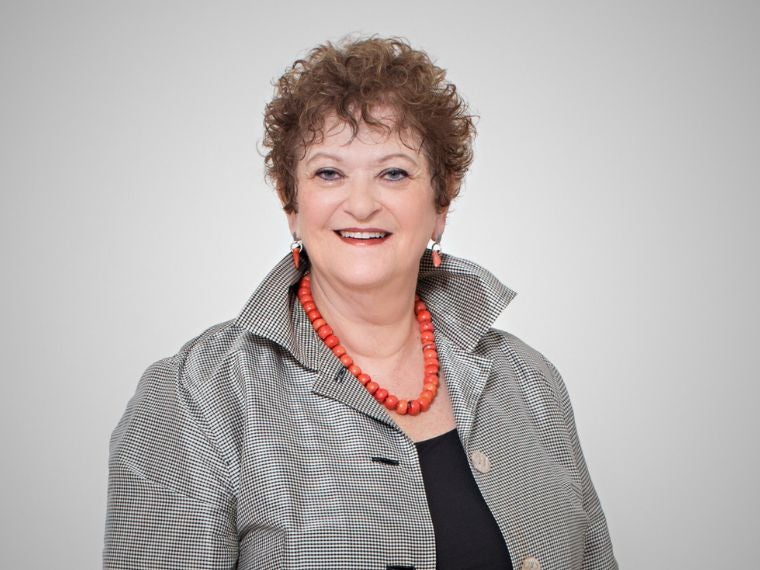 woman similing and looking at camera