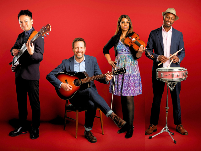 four musicians, holding instruments