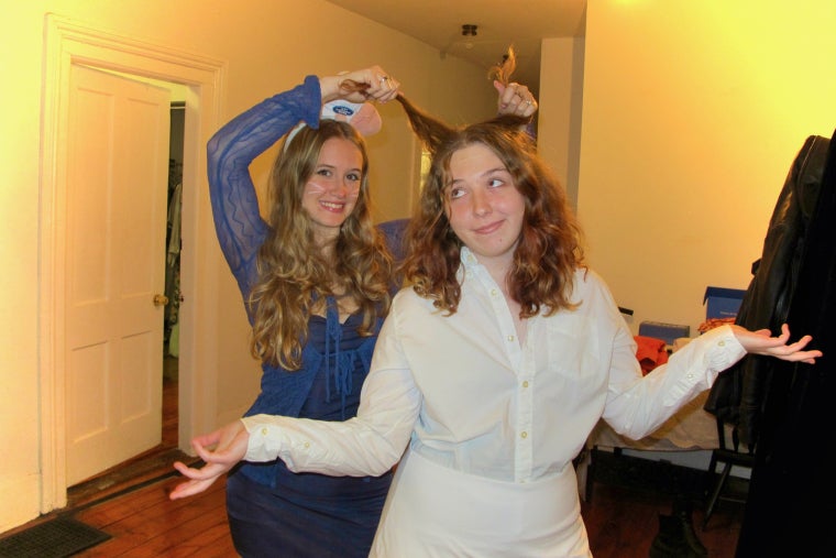 A digital picture of Natalie dressed as Ratatouille and Anna as Linguini