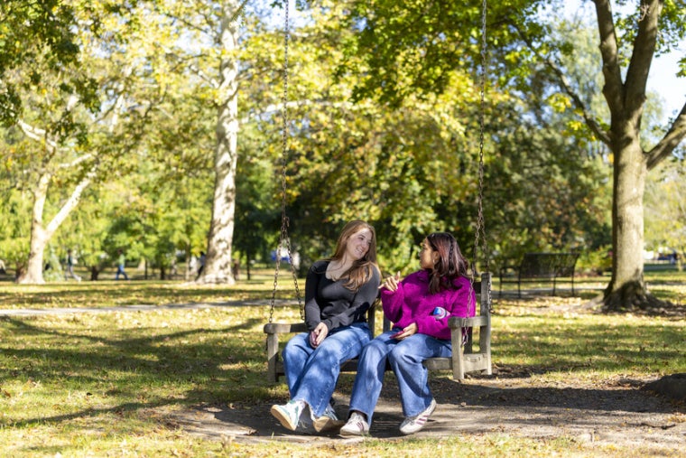 Students enjoying a tree swing in Tappan Square