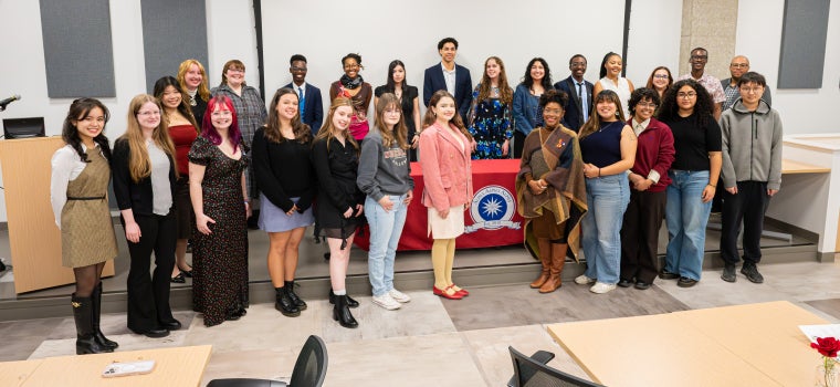 Newly inducted Tri-Alpha members stand for a group photo