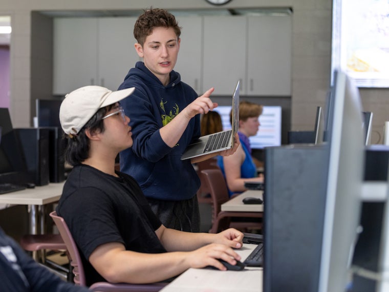 Two students at a computer
