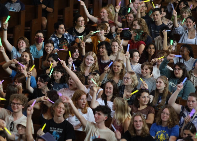 Students with glow sticks during 2023 Orientation 