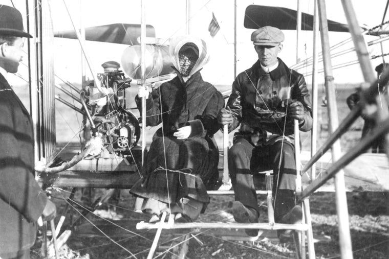 Katharine Wright in a plane with Wilbur Wright