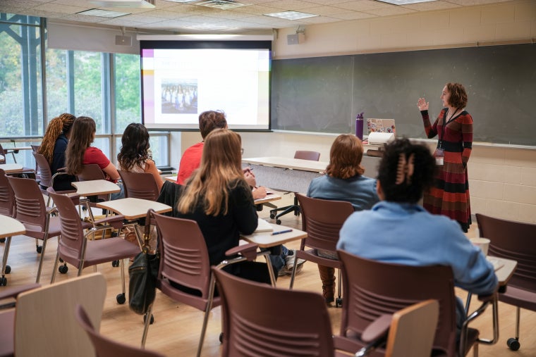 Student facilitating workshop on religion and media. Photo by Sam Yang.