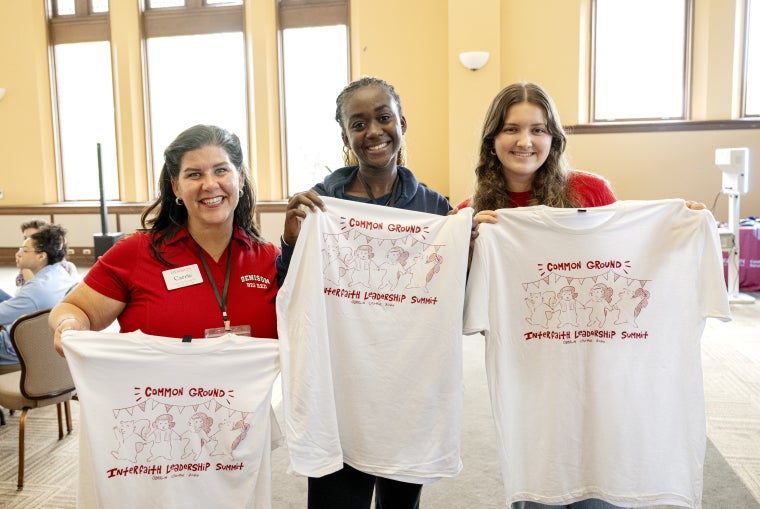 Interfaith Summit participants with their branded t-shirts. Photo by Mike Crupi.