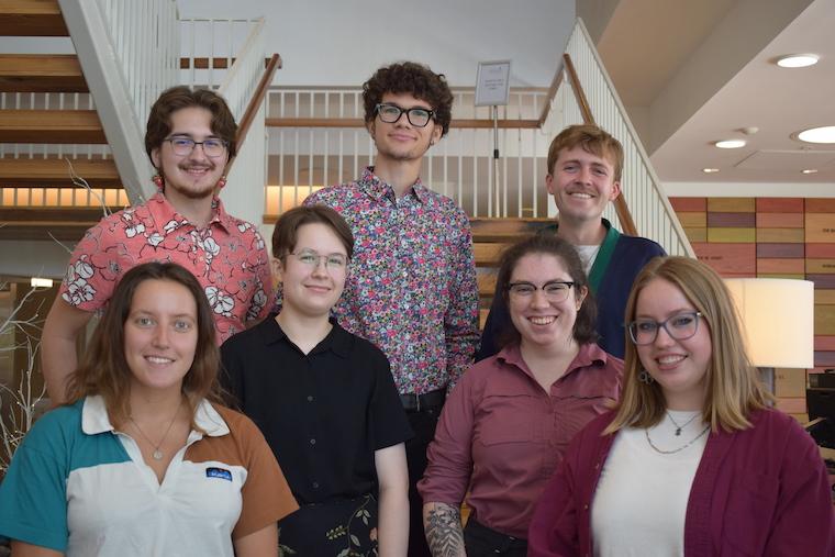 Seven Oberlin students standing on a staircase.