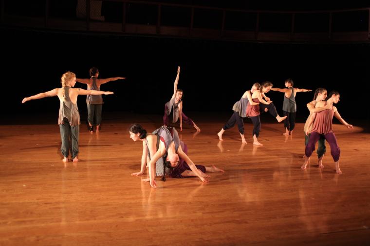 A group of women perform a dance routine