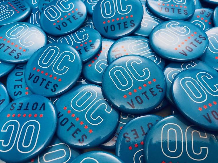 collection of voter buttons.
