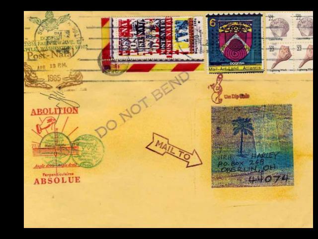 a variety of postage stamps artfully applied to a page