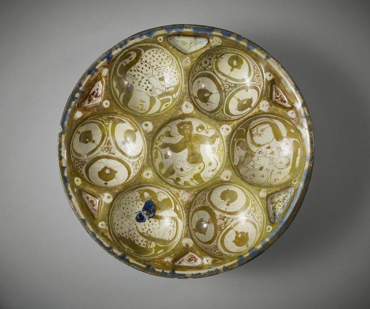 Dish with seven sections, intricately decorated