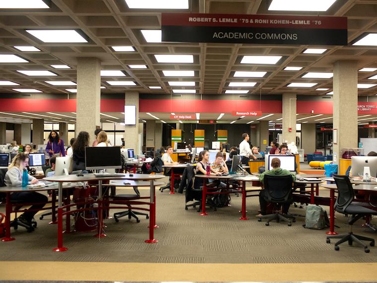 students study in main library commons area.