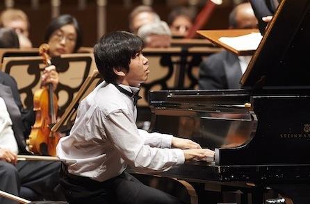 Yang performs at the piano