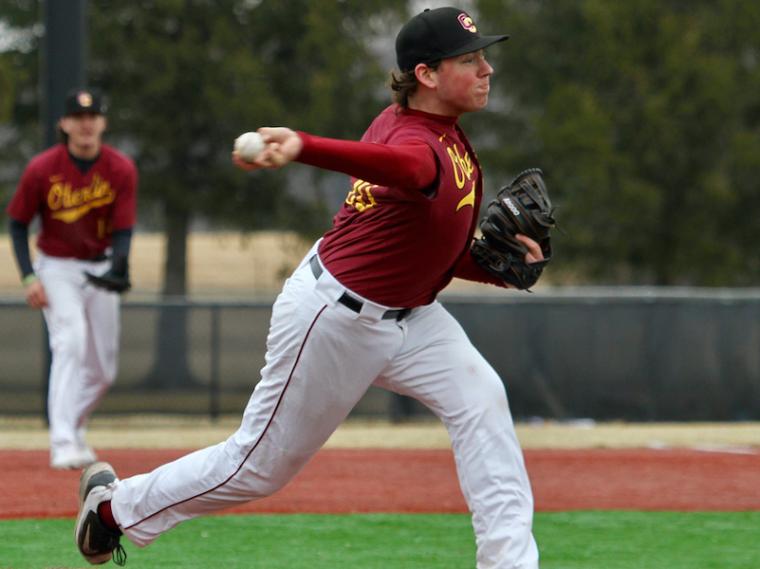 Oberlin baseball player Ian Ashby throwing a pitch.