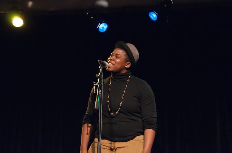 person singing into a microphone