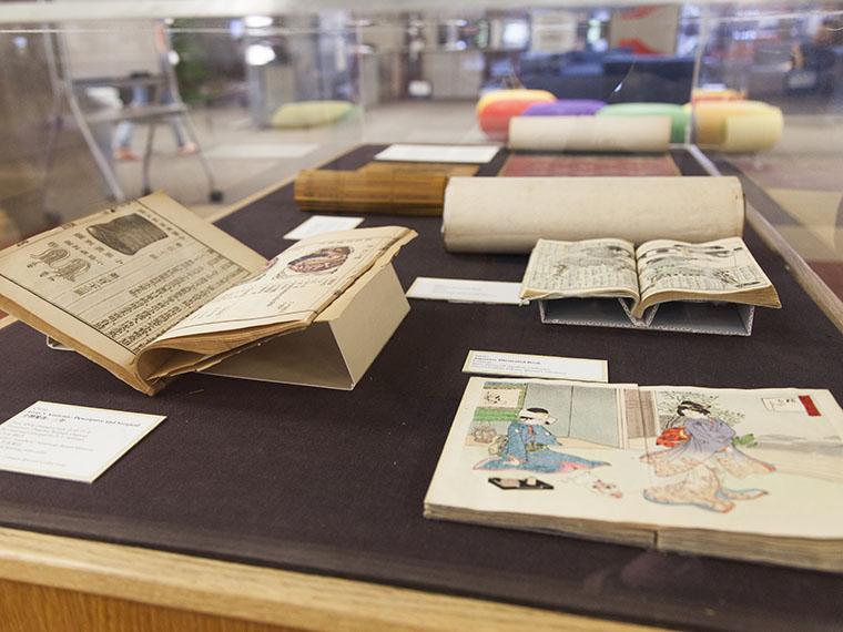 Japanese books on display in an exhibit case