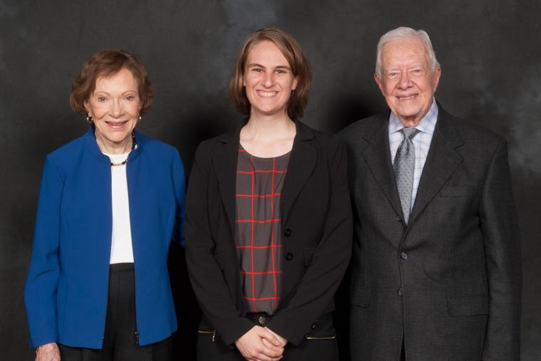 Sarah Cole ’14 posed with former President Jimmy Carter and his wife, Rosalynn 