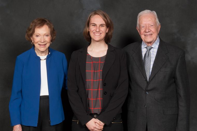 Sarah Cole ’14 posed with former President Jimmy Carter and his wife, Rosalynn 
