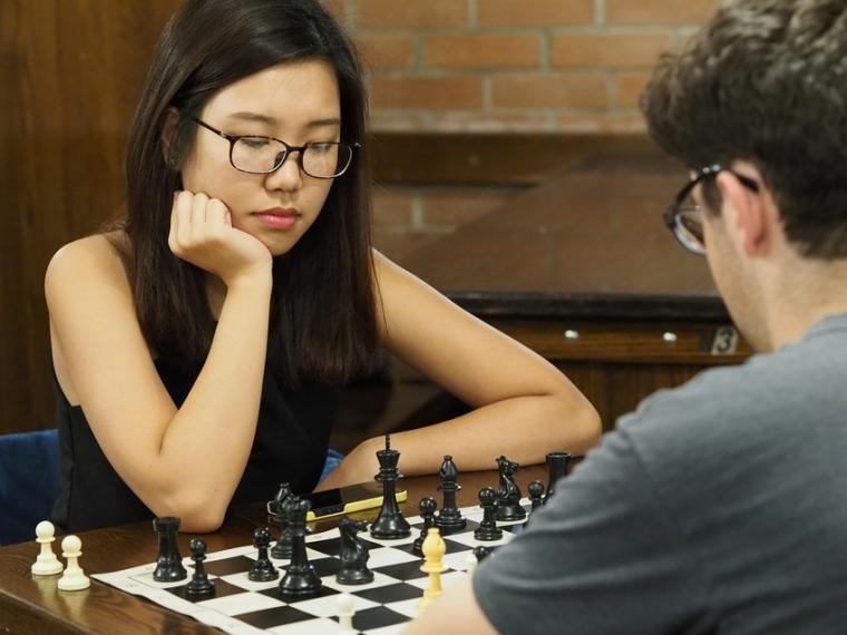 Students playing chess