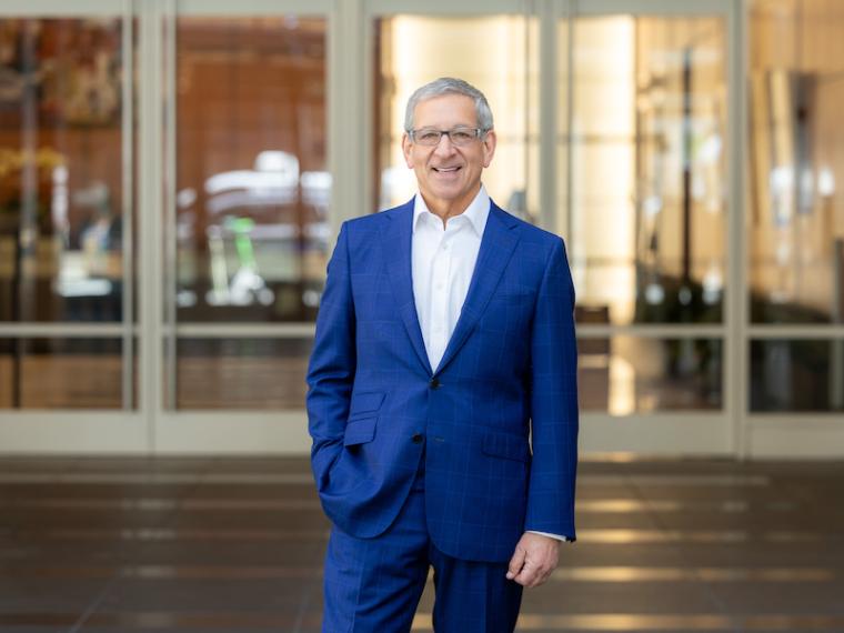 Charles S. Birenbaum standing in front of a grand entrance.