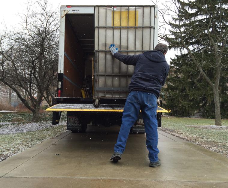 Loading letters onto the mail truck