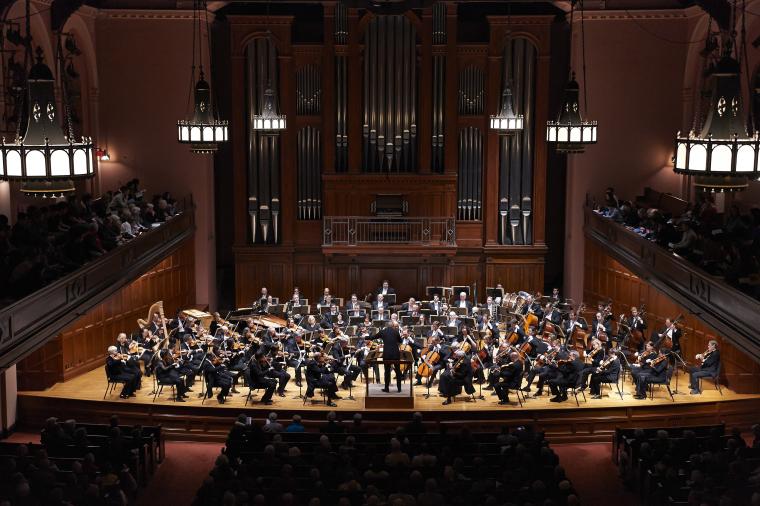 Orchestra on stage in Finney Chapel
