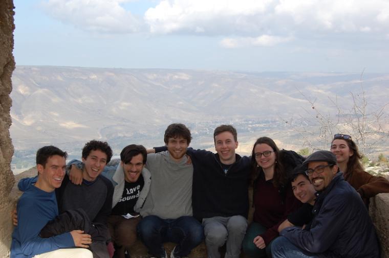 eight students pose for a photo