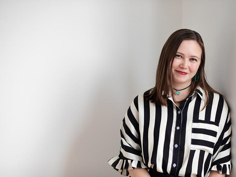 photo of Cora Hasegawa wearing balck and white striped shirt.
