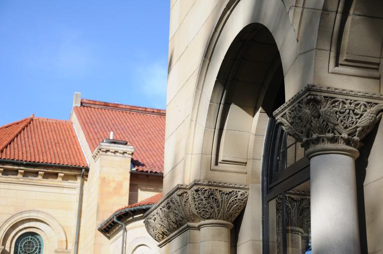 Closeup of stone arch and columns