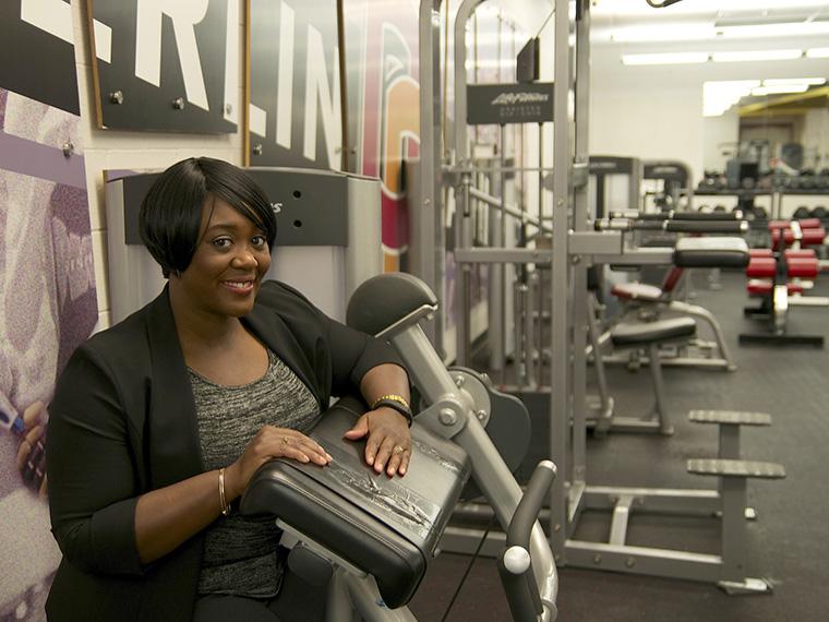 Donna Russell next to fitness equipment