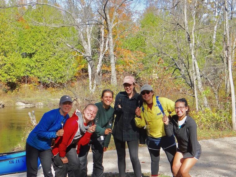 Outing Club students take a quick break from canoeing in Michigan