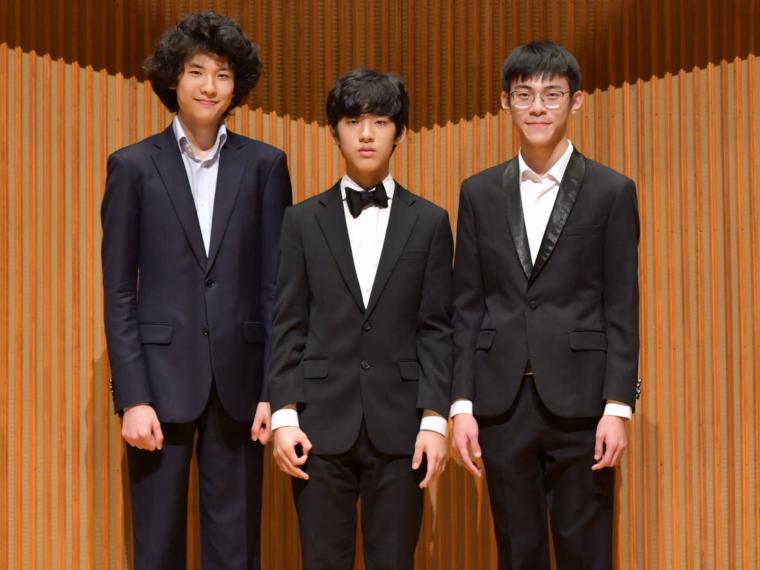 Three boys in formal attire