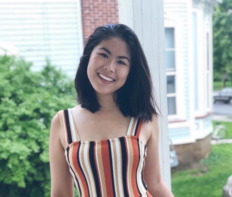 Elayne Zhou smiles into the camera