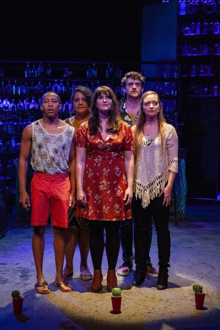 Cast members of "Everything Is Okay (And Other Helpful Lies) posing on stage