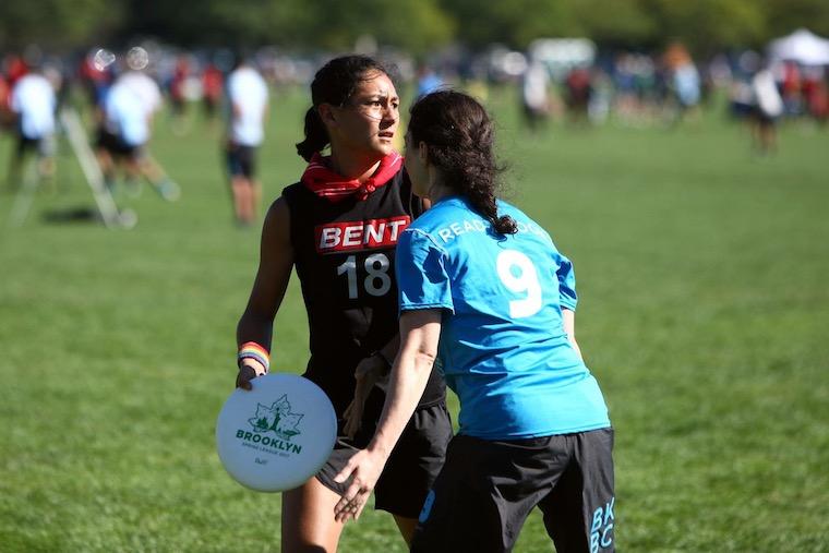 Action shot of Abbey Cheng playing ultimate