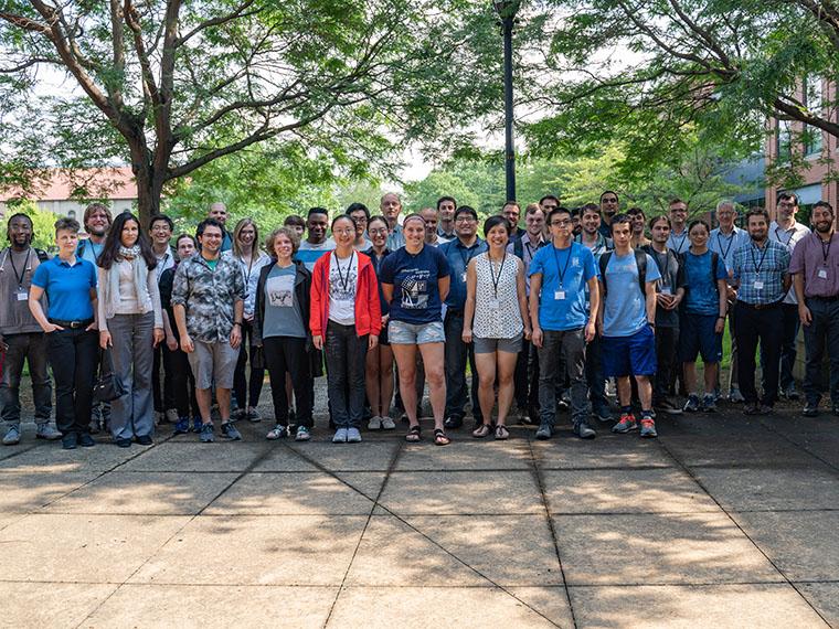 meeting attendees standing together