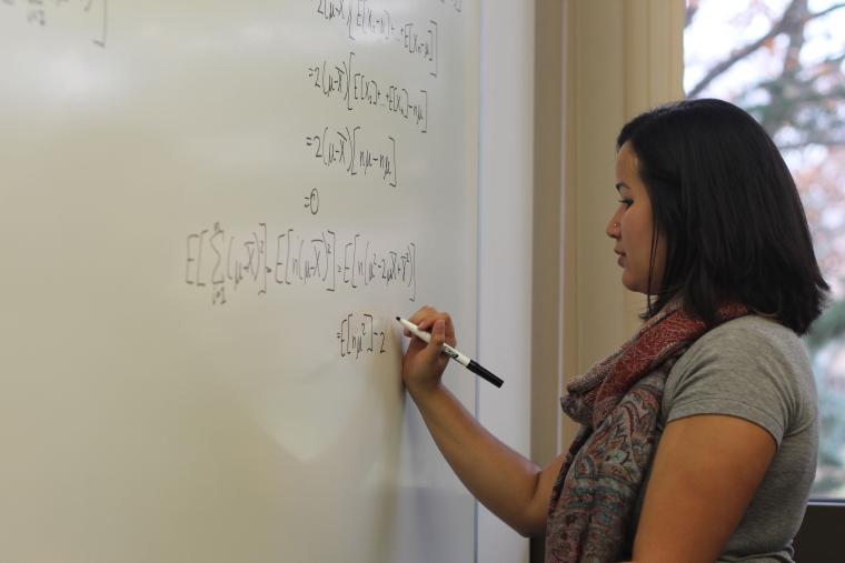 White board with math equations