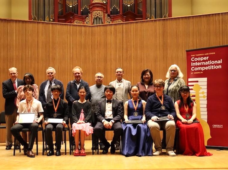 Cooper Competition Judges, Participants and Thomas and Evon Cooper on Warner Concert Hall stage