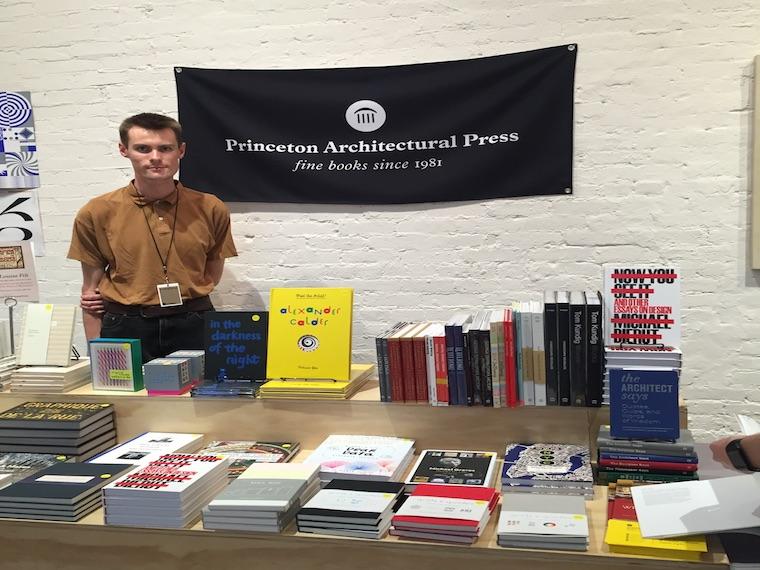 Sudent with book dispay