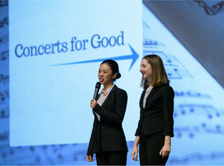 Jenny Huang and Celina Kobetitsch presenting at a conference.
