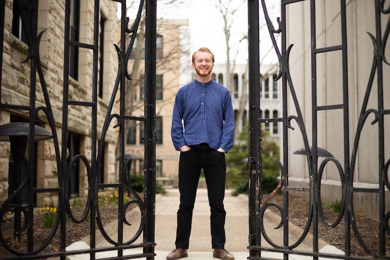 Picture of man standing in courtyard