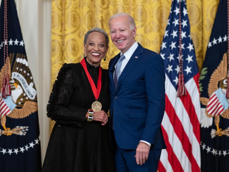 Johnnetta Cole posing with Joe Biden at the White House.